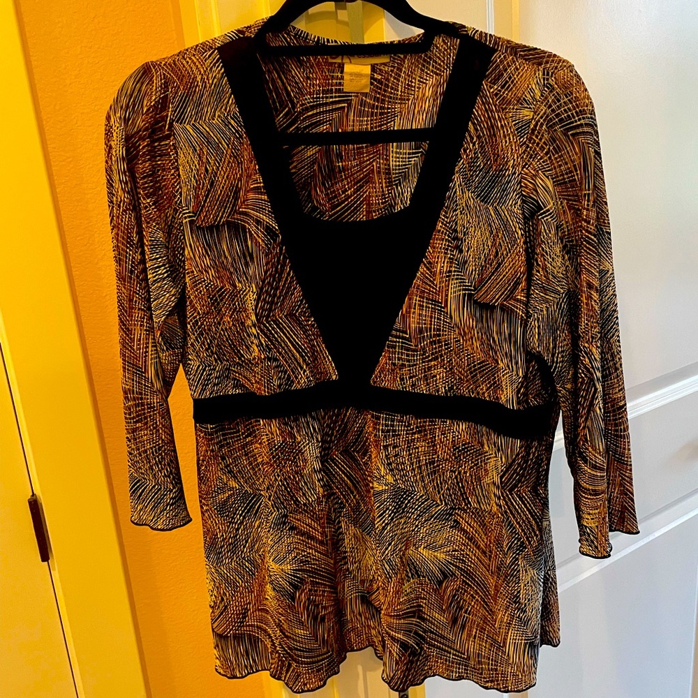 Dressbarn Women’s L in black, rust, browns, and cream in a beautiful pattern.